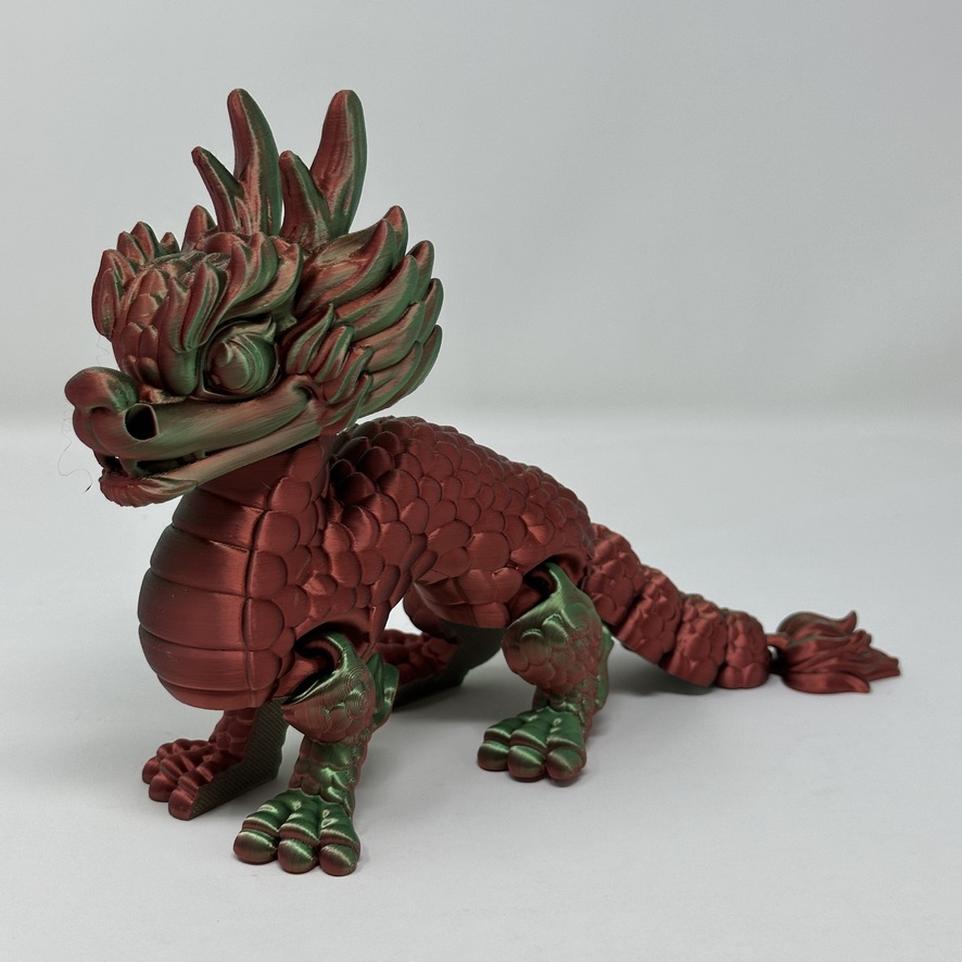 Articulated red and green 3D printed dragon