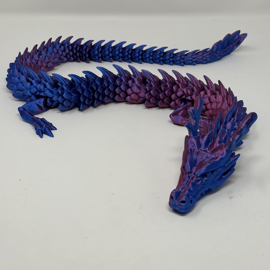 Long blue and violet articulated 3D printed dragon