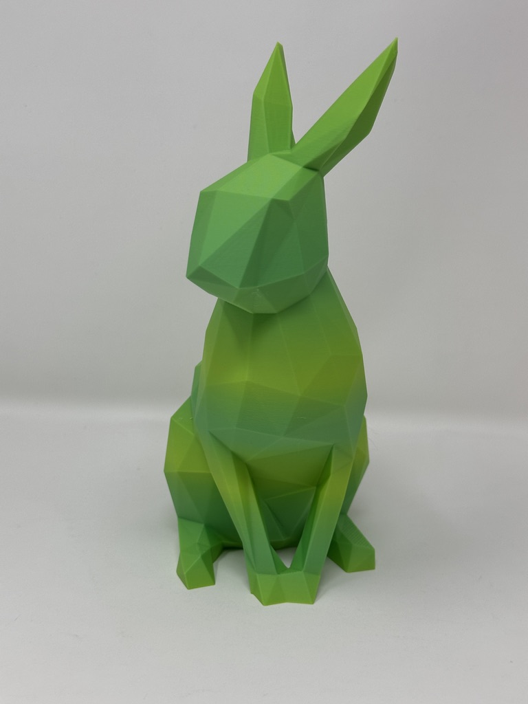 Bright green low-poly 3D printed rabbit